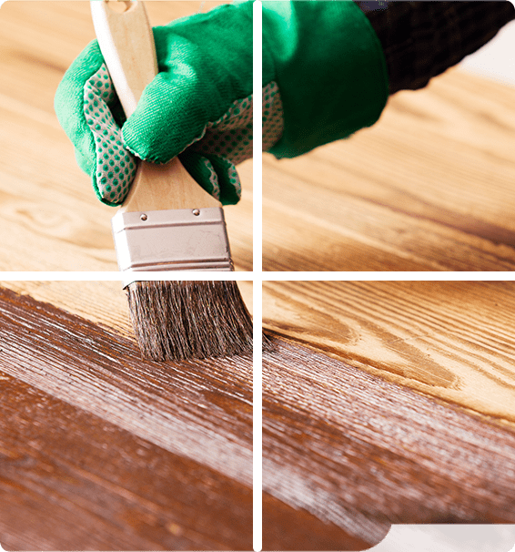 A person painting the wood of a floor.