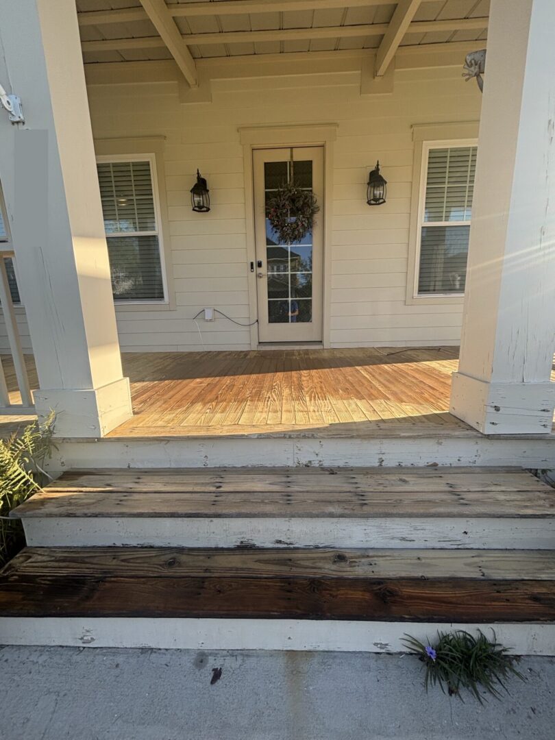 Gray, weathered porch steps before deck staining in Summerville, SC. Prep comes first