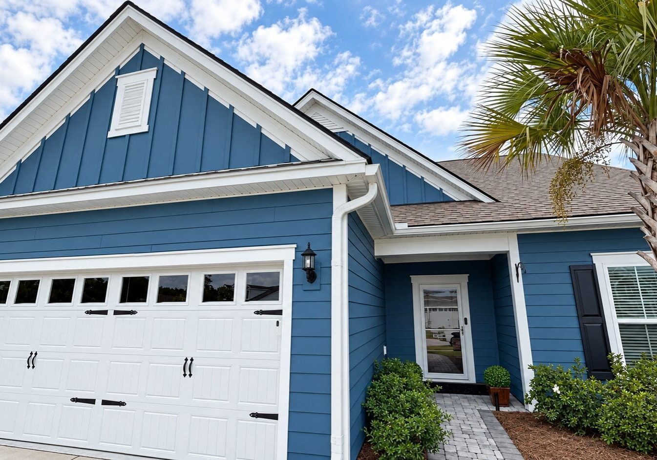 Summerville, SC home with freshly painted blue siding by Low Country Painting.